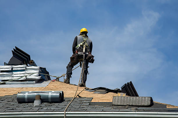 Professional Roof Replacement technician working in Elkton, OR